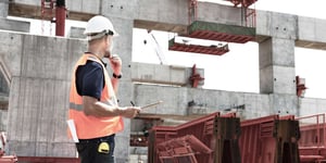What needs to be included in a construction contract?